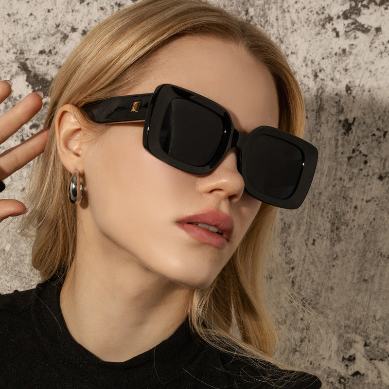 New Retro Square Large Frame Sunglasses Men And Women Trendy worn by a model with blonde hair, stylish and fashionable.