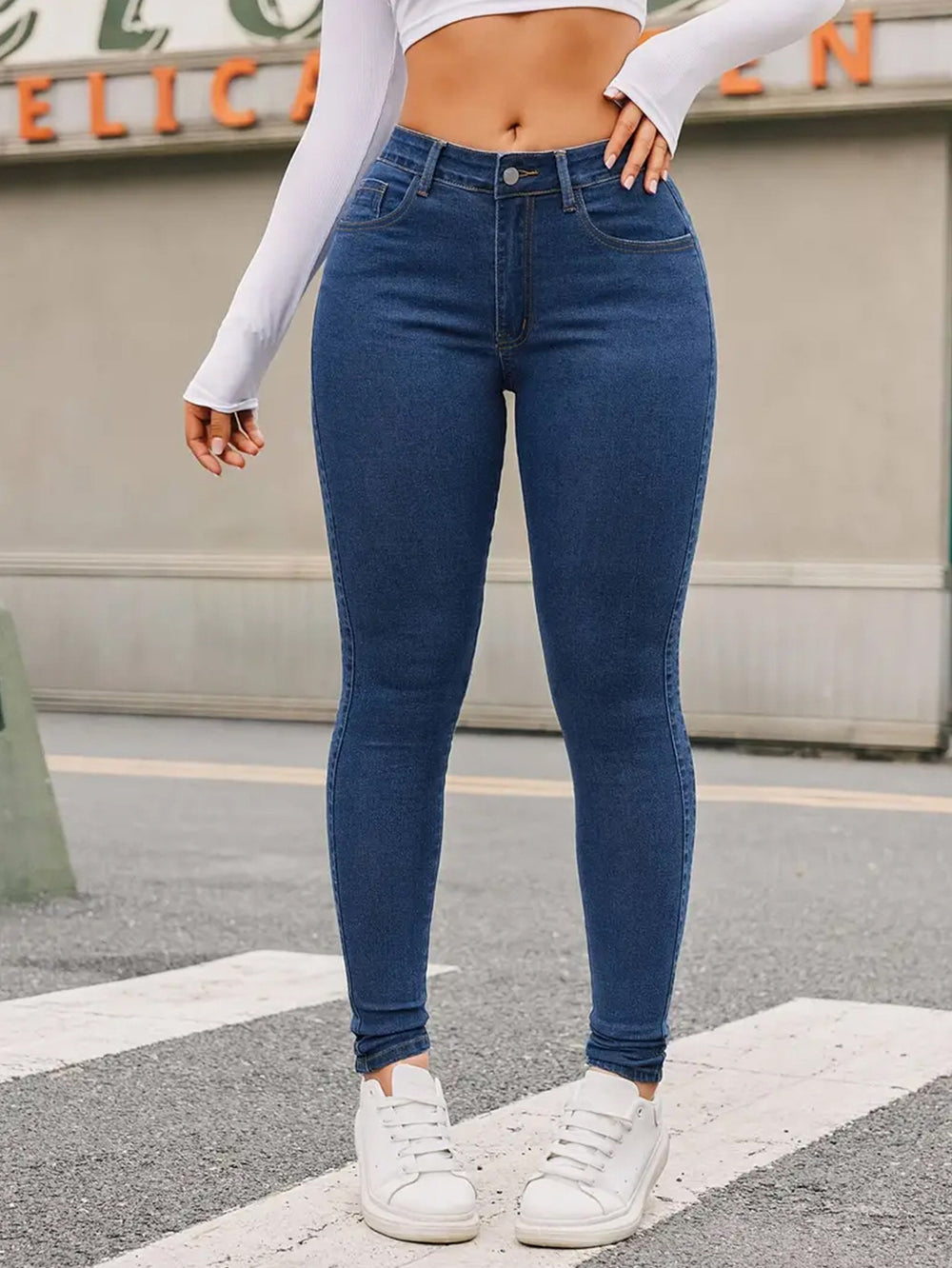 Skinny Stretch Feet Pants Jeans in blue denim, stylish street hipster pencil pants for a fashionable look.