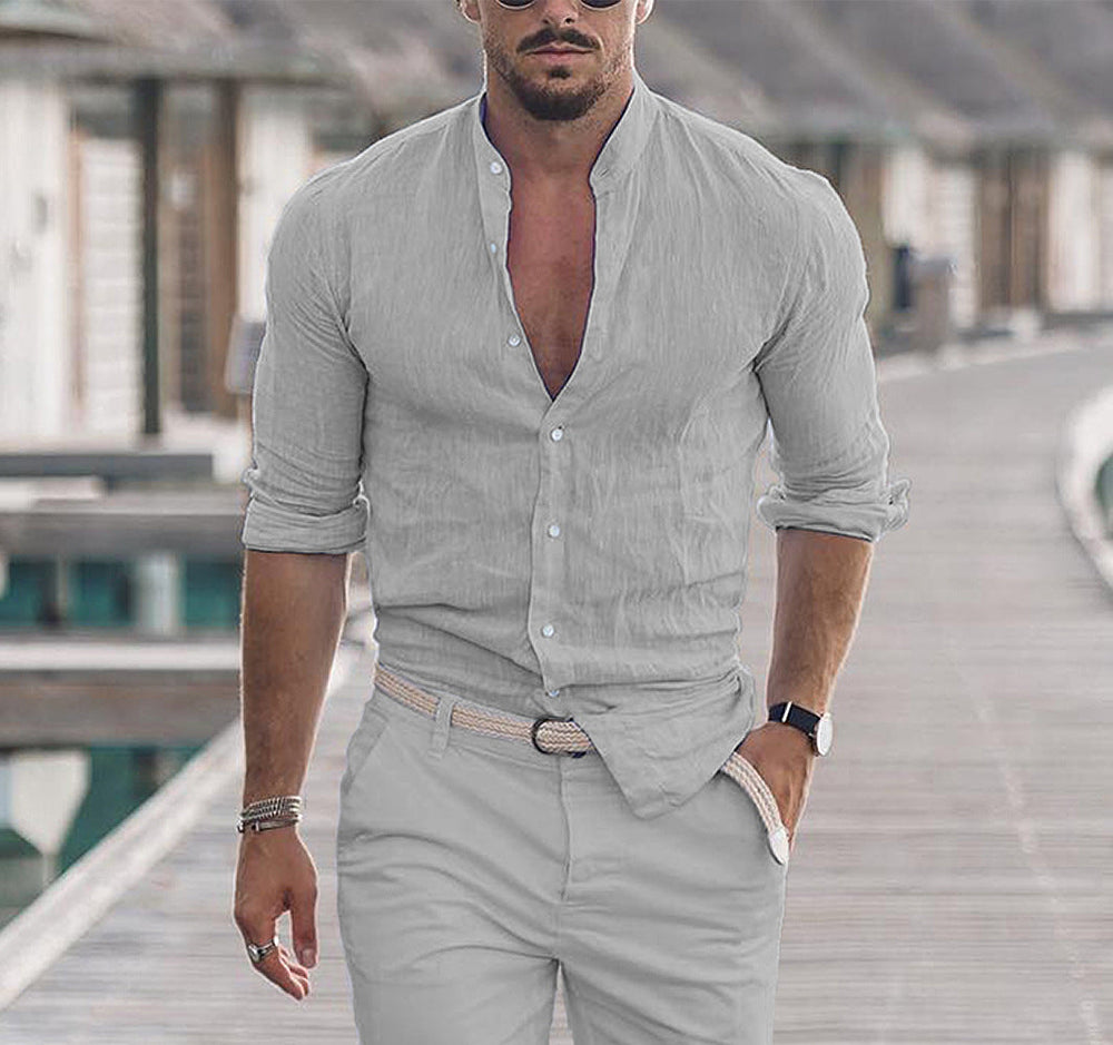 Men's Long Sleeve Shirt With Button Casual Solid Color Tops For Spring Autumn worn by a model on a boardwalk.