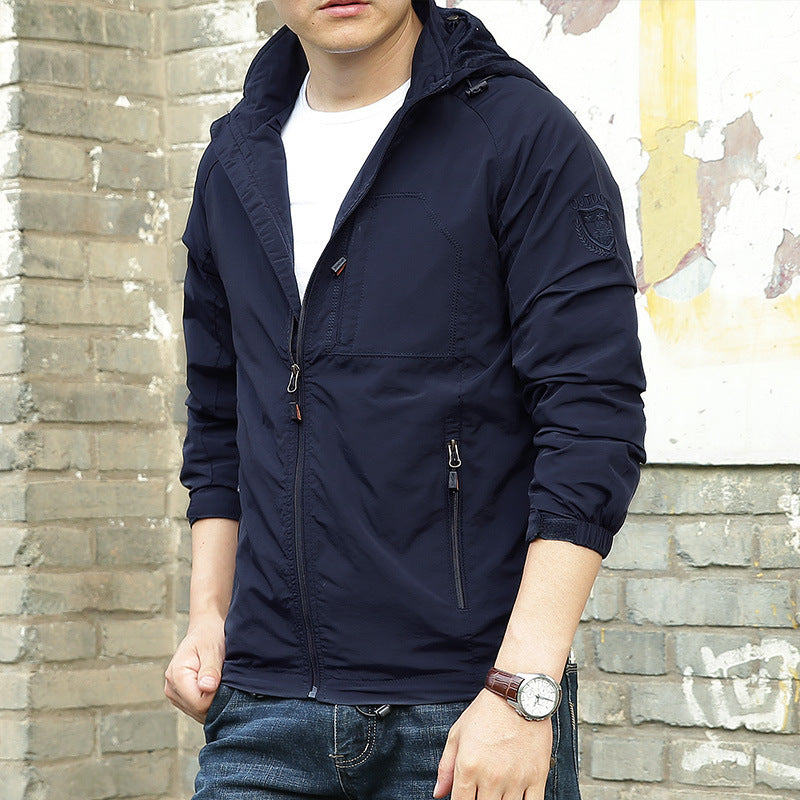Men's Fashion Solid Color Single Outdoor Jacket worn by a man standing against a brick wall.
