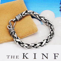 S925 Sterling Silver Retro Domineering Handcraft Bracelet displayed on a soft surface with branding.