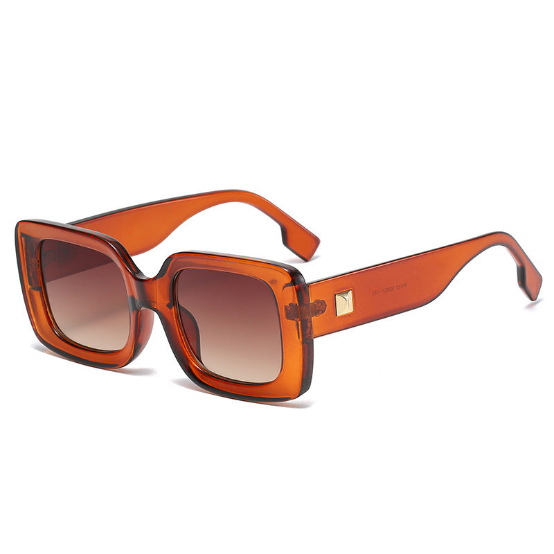 New Retro Square Large Frame Sunglasses Men And Women Trendy in brown lens and orange full-frame design.