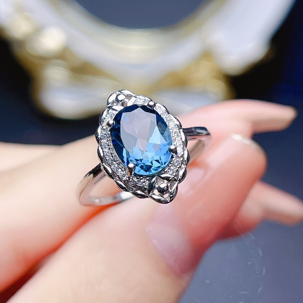 Jewelry Natural Topaz Ring S925 Silver with a blue topaz stone and intricate silver detailing