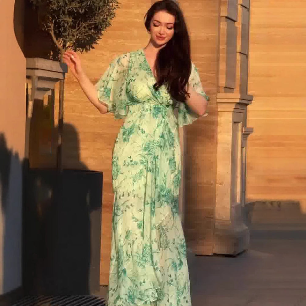 Soft Fresh And Sexy Short Sleeve Floral Dress displayed on a model against a stylish backdrop.