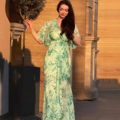Soft Fresh And Sexy Short Sleeve Floral Dress displayed on a model against a stylish backdrop.